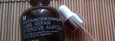 Multi function formula. snail repair  intensive ampoule. mizon