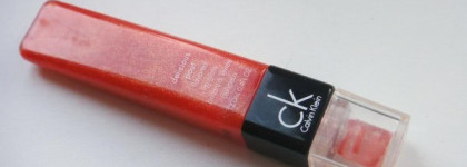 Calvin Klein Delicious Pout Flavored Lip Gloss # LG21 Tangerine Shimmer
