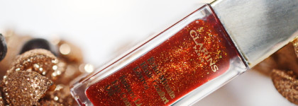 Рождество Clarins: Instant Light Lip Comfort Oil #09 Red Berry Glam