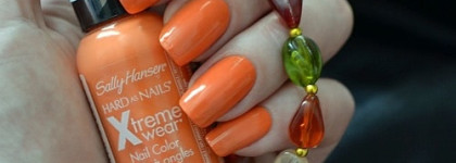 Апельсин, зацелованный солнцем. Sally Hansen Sun Kissed #150
