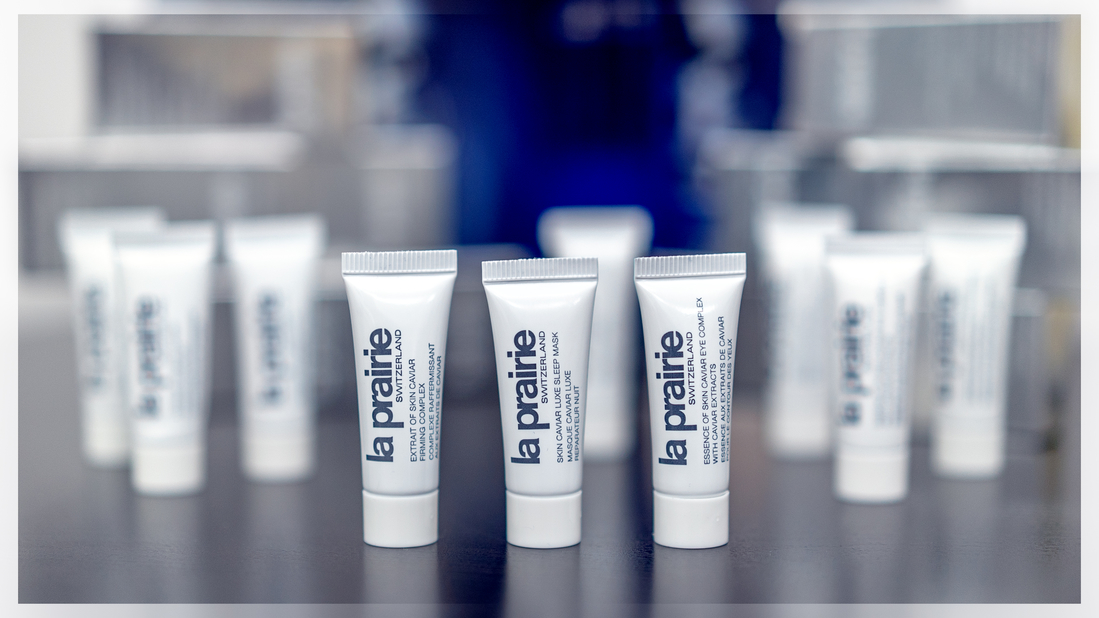 Слева направо: a) Extrait of Skin Caviar Firming Complex, b) Skin Caviar Luxe sleep mask, c) Essence of Skin Caviar eye Complex.