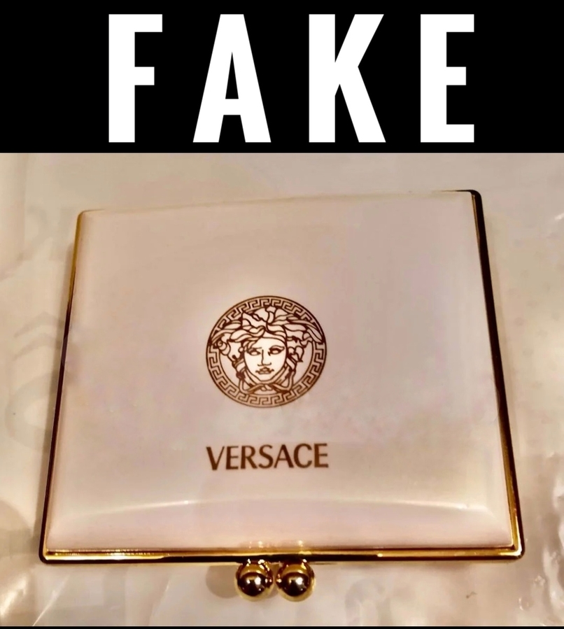 Это подделка fake  Versace