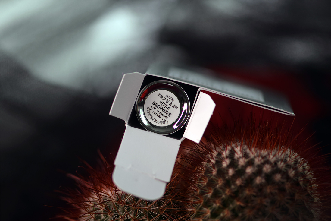 Наклейка на дне флакона